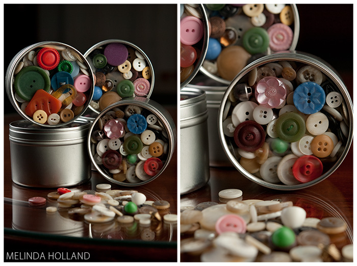 Colorful buttons in tin canisters.
