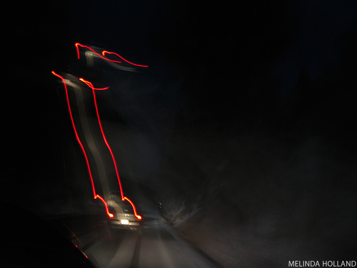 Lights at Night (car, red tail lights, sonora pass)
