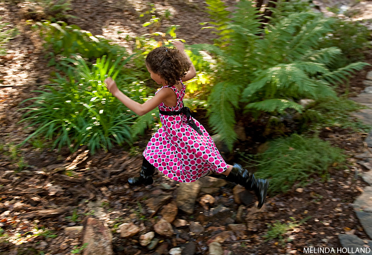 Mya Jumping across a creek
