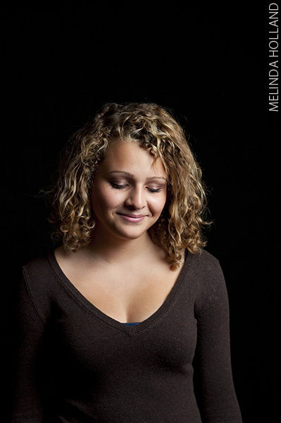 Hannah looking down with smile